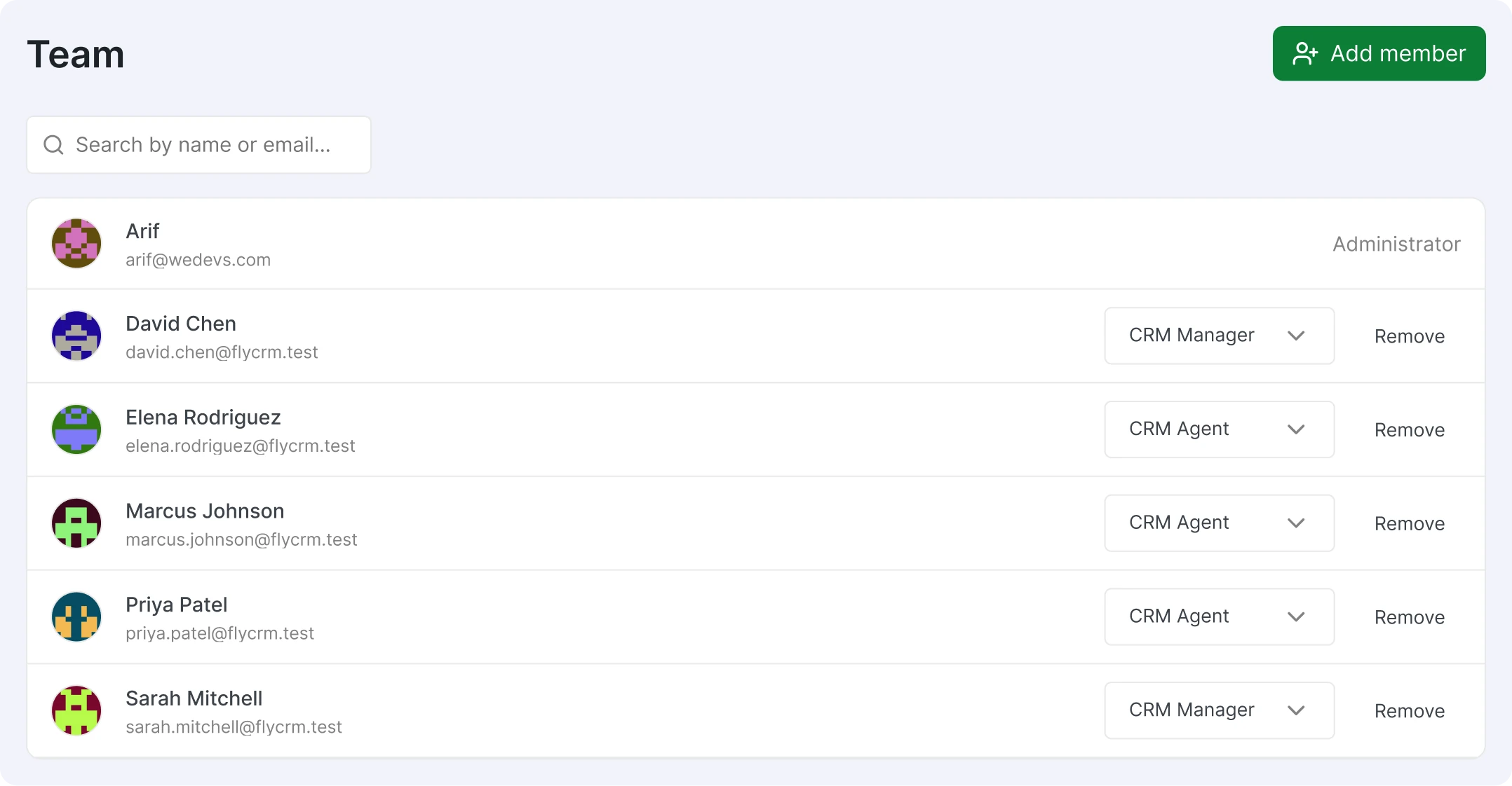 The FlyCRM Team screen, listing members with a role selector set to CRM Manager or CRM Agent.